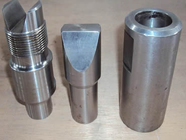 Three parts of wedge left-hand thread drive rod on the table.