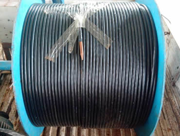 A blue roller of heating cable on the truck.