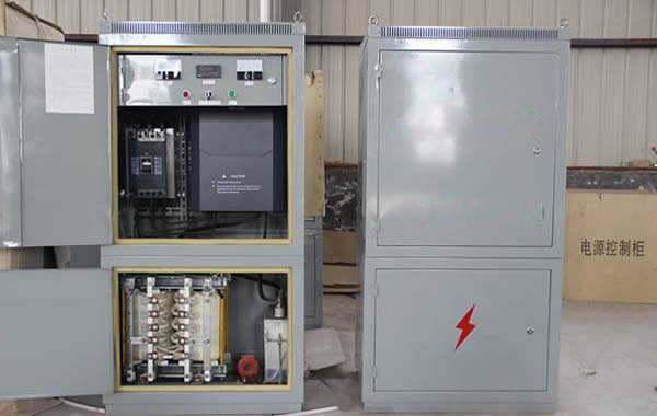 A opened and a closed middle frequency power control cabinet in the warehouse.