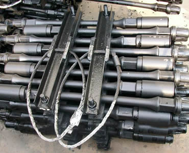 A bundle of sucker rod is packaged by the angle steel and bolts.
